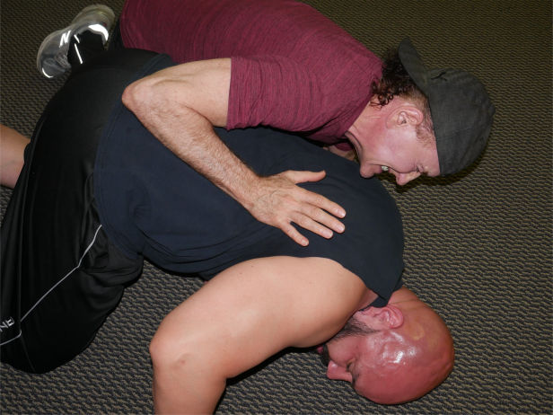Mike Akins and Shayne Pearman wrestling.